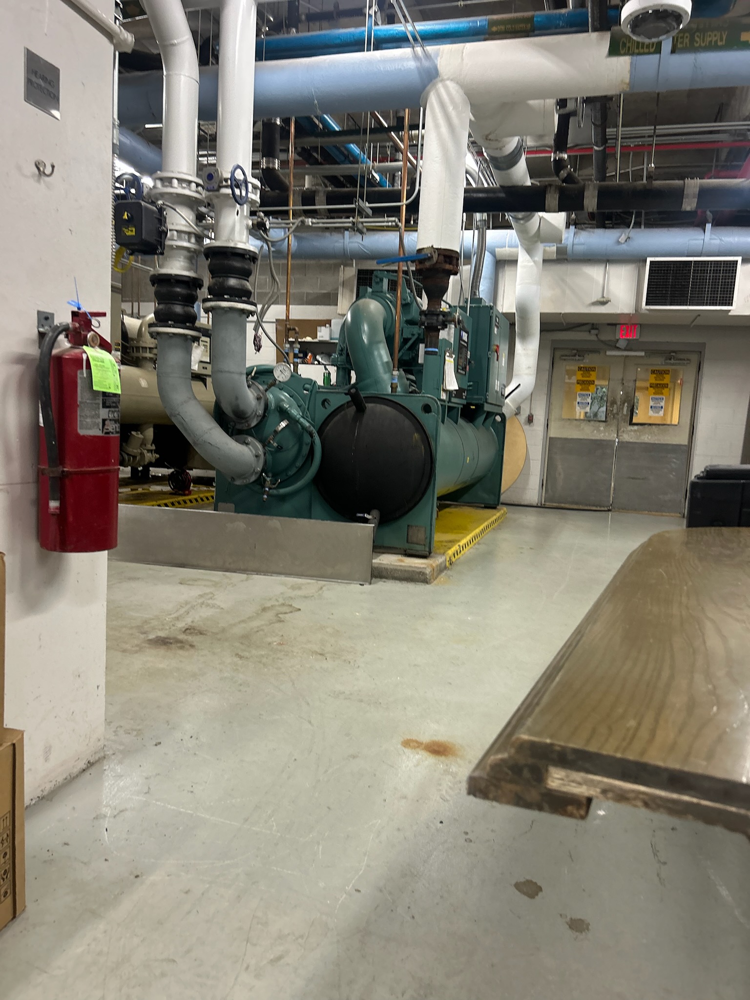 Commercial chiller and HVAC mechanical room managed by BemossTX in Texas